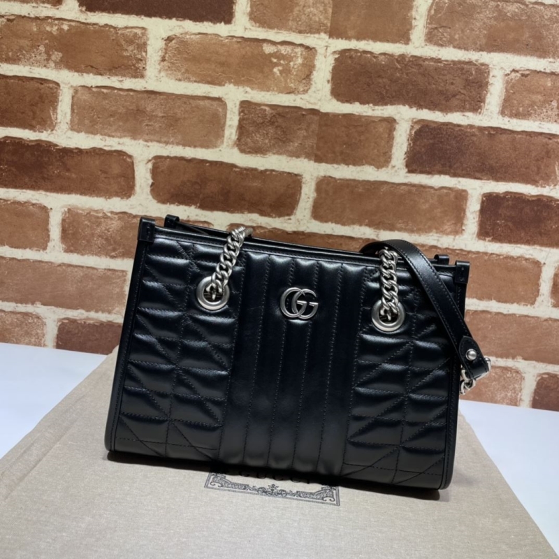 G*u*i shopping bags